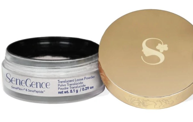 Official SeneGence Translucent Loose Powder jar beside its gold lid